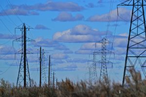 low angle view of posts under blue calm sky